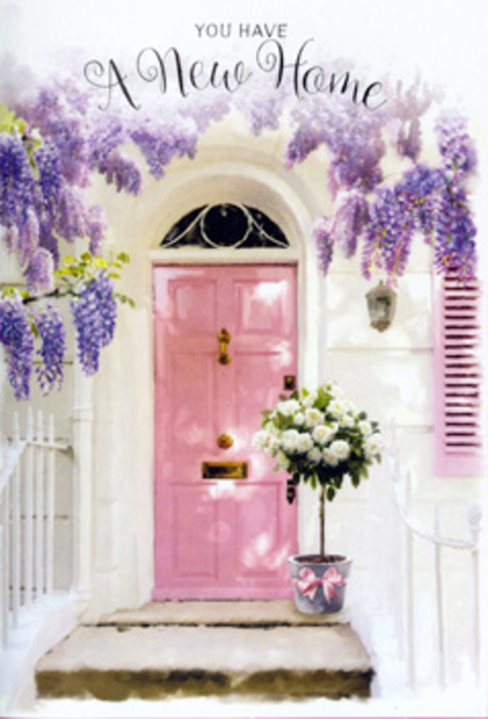 A romantic entranceway in Surrey is captured here in delicate detail, offering a visual ode to the moment when a house first starts to feel like home. The focal point is a pastel pink front door, finished in a soft, velvety paint that diffuses the light rather than reflecting it, creating an almost storybook charm you might find tucked along quiet streets in Reigate or Cobham. The door is set within pristine whitewashed walls, their pale surface catching subtle shadows cast by a profusion of wisteria spilling from above. The wisteria's trailing stems are thick with clustered blossoms in shades of lavender and dusty lilac, hanging like floral garlands that frame the doorway in gentle, romantic curves. A single shutter, brushed in a complementary blush tone, adds balance and a hint of rustic elegance. At the base of the door, resting solidly on the step, stands a grey metal bucket repurposed as a chic container for a lush bouquet. Inside it, large-headed white and cream roses crowd together, their petals overlapping in soft spirals that convey both abundance and tenderness. Interwoven throughout are sprigs of fresh green foliage, adding a cool contrast and airy texture that keeps the arrangement from feeling too formal. A satin ribbon in a pale pink hue is tied snugly around the bucket, its bow small but deliberate, echoing the colours of both door and wisteria to create a seamless, pastel harmony. You can almost imagine the scent drifting out to the garden path: fresh roses mingling with wisteria sweetness and the faint earthiness of Surrey's leafy surroundings. The mood is hopeful, calm, and deeply welcoming, a floral embrace for whoever has just crossed this threshold for the first time.